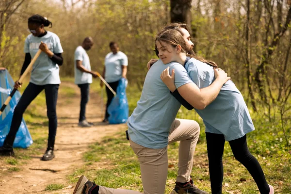 Volunteers cleaning up a forest teenager